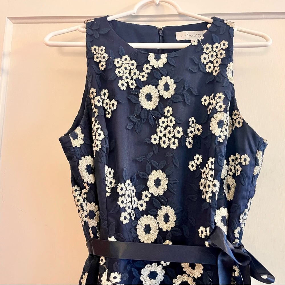 Tahari Elegant Sleeveless Dress with White Floral Embroidery over Deep Blue - Picture 3 of 14
